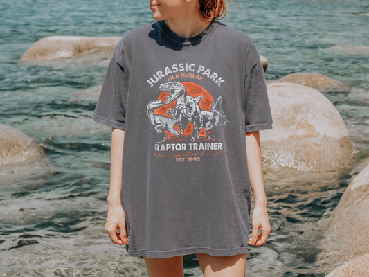 Raptor Trainer Shirt – Funny Dinosaur Graphic Tee – Unisex T-Rex Trainer Shirt – Jurassic-Inspired Tee